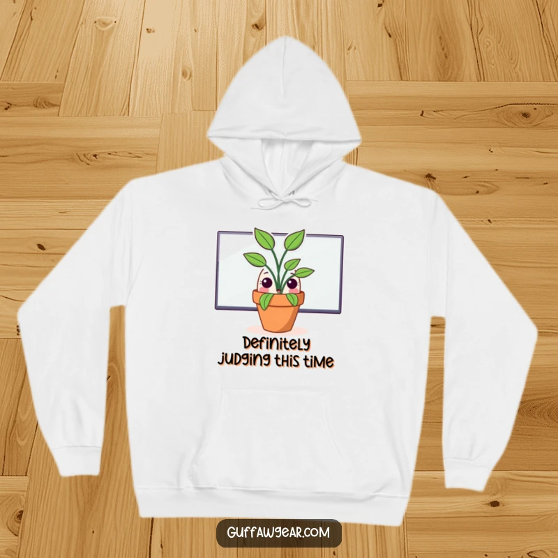 Funny hoodie featuring a potted plant character secretly peeking from behind a large computer monitor, perfect for cozy, humorous relaxation.