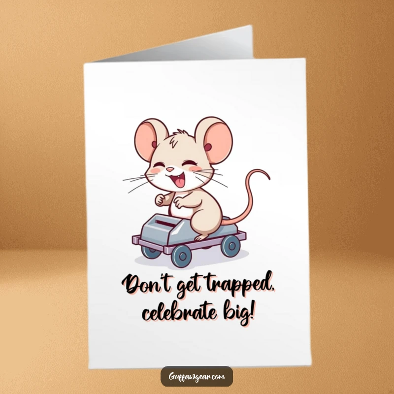 Funny Free Printable Birthday Card: Giggling computer mouse character joyfully riding a rolling mouse trap, a wild and funny celebration.