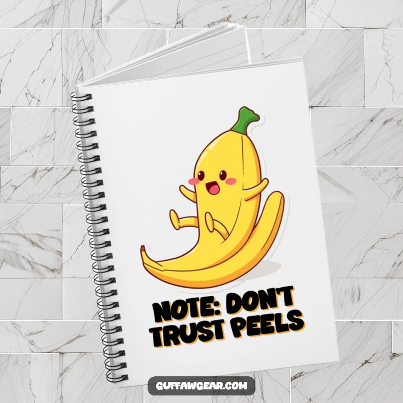 Funny notebook cover with a food character comically slipping on a banana peel, legs flailing, a humorous design for note-taking and brainstorming.