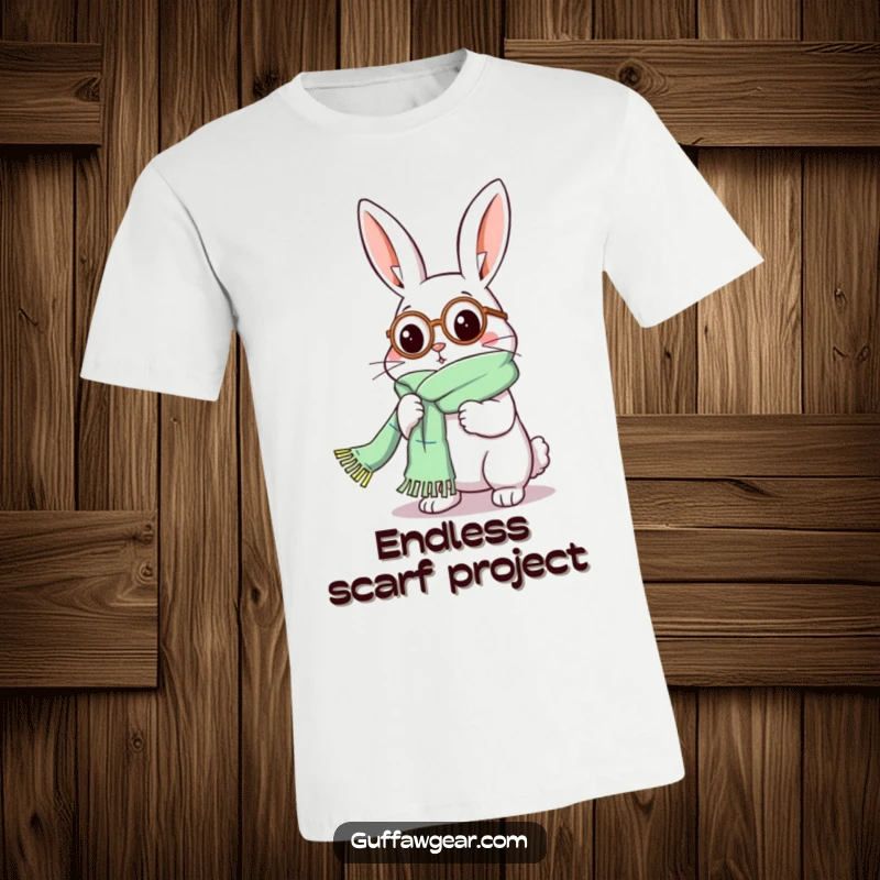 Funny Rabbit T-Shirt: A rabbit in a monocle comically attempts to knit a scarf that has become excessively long.